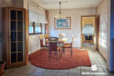 Esszimmer - RESERVIERT – BERK Immobilien – 4-Zi.-ETW mit Balkon, Kaminofen & Carport in Elsenfeld zu verkaufen