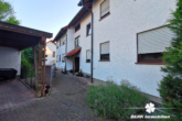 Aussenansicht - RESERVIERT – BERK Immobilien – 4-Zi.-ETW mit Balkon, Kaminofen & Carport in Elsenfeld zu verkaufen