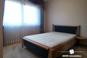 RESERVIERT – BERK Immobilien – 4-Zi.-ETW mit Balkon, Kaminofen & Carport in Elsenfeld zu verkaufen - Schlafzimmer (105777)