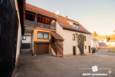 Außenansicht - KI optimiert - BERK Immobilien – Ein Ort zum Ankommen: Haus mit Charakter & weitläufigem Grundstück