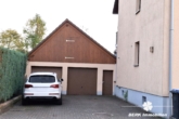 Garage - BERK Immobilien – Kapitalanlage oder Eigennutzung: Mehrfamilienhaus mit 3 Wohneinheiten in Kleinheubach