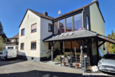 Titelbild - BERK Immobilien – charmantes Ein- bis Zweifamilienhaus mit weiterem Baugrundstück im Ortskern von Mömbris