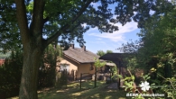 Seitenansicht - BERK Immobilien – Einfamilienhaus zum Verlieben mit Panoramablick & Waldrandlage in Klingenberg/Röllfeld
