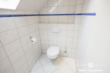 BERK Immobilien – Traumhafte 5-Zimmer Maisonette Wohnung in bevorzugter Lage von Schaafheim/ Radheim - Gäste WC (107578)
