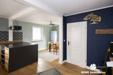 BERK Immobilien – Einfamilienhaus mit Weitblick & außergewöhnlichem Grundstück - EG (111965)