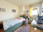 Schlafzimmer - BERK Immobilien – Charmante 2-Zimmer-Wohnung mit großer Loggia in Dietzenbach