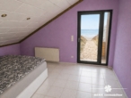 Schlafzimmer DG - BERK Immobilien – Großzügiges 1–2 Familienhaus mit Loggia, Garten & PV-Anlage, Toplage AB-Damm