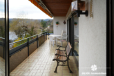 Balkon - BERK Immobilien – Gartenparadies am Waldrand mit gigantischem Ausblick – Haus in TE in Laudenbach