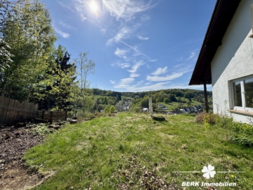 BERK Immobilien – Charmantes Einfamilienhaus in idyllischer Hanglage von Rothenbuch - Garten (104531)