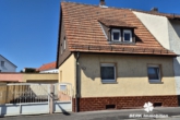 Titelbild - BERK Immobilien – Charmantes Einfamilienhaus mit Potenzial im Herzen von Stockstadt