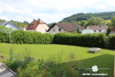 BERK Immobilien - Garten - BERK Immobilien – Mehrfamilienhaus mit vielen Möglichkeiten – Selbstnutzer oder Kapitalanlage in Hardheim – Bretzingen