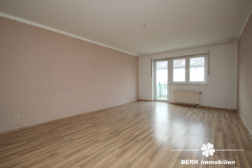 BERK Immobilien – 3-Zimmer Eigentumswohnung mit Balkon und TG-Stellplatz - Wohnzimmer (109442)