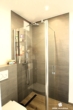 Bad mit bodentiefer Dusche - BERK Immobilien – Ruhige Feldrandlage! Moderne 3-Zimmer-Wohnung mit Balkon & Stellplatz