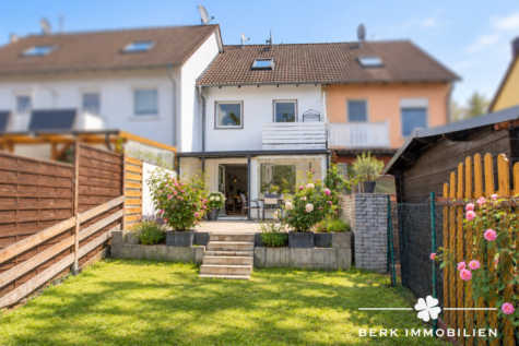 BERK Immobilien – Gepflegtes Reihenmittelhaus mit Garten und viel Platz zum Wohlfühlen - Außenansicht vom Garten (KI optimiert) (129842)