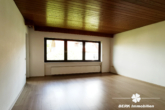 BERK Immobilien - Wohnzimmer OG - BERK Immobilien – MFH, Mehrgenerationenhaus, Anlageobjekt – Gelegenheit in Eschau mit drei Wohnungen