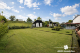 Garten (KI-optimiert) - BERK Immobilien – Wohnen und Ausbauen auf einem großzügigen Grundstück mit ca. 1.283 m²