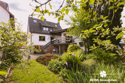 BERK Immobilien – Wohnen mit Charme und großzügigem Raumangebot in Keilberg - Garten- und Hausansicht (127953)